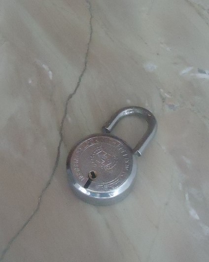 Broken lock after theft attempt in Sector 15 Panchkula.
